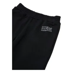 Pantaloni con orlo diviso><noscript><img width=